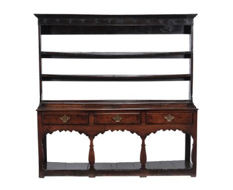  A George III oak dresser,   circa 1770, the three open shelves  with wrought iron cup hooks above  the base with  three shor