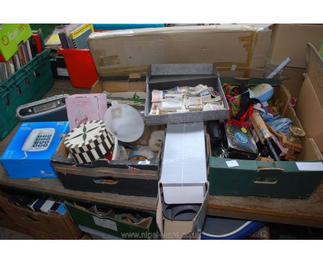 Four boxes of phones, frames, cigarette cards, trinket boxes, toy soldiers, Lego, calculators etc.