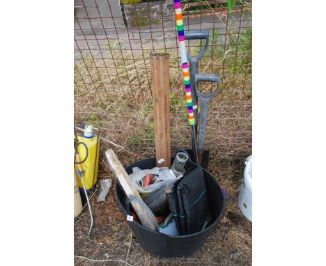  Black muck bucket, galvanized wire, brush, fork, spade etc.