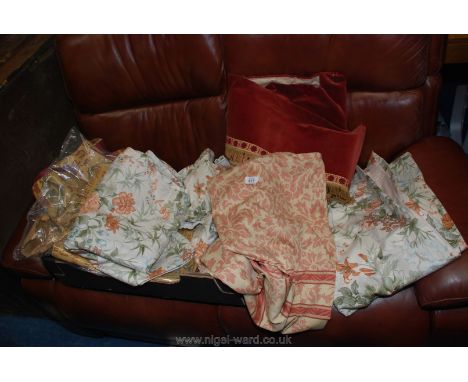 A quantity of curtains and fabric.