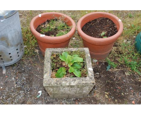 Two plastic 17'' diameter flower pots and a square concrete planter.