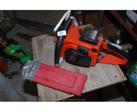 Echo 330EVL chainsaw and guard.