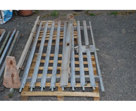 A palisade gate 52" wide 94" high including hinge post and latch post.