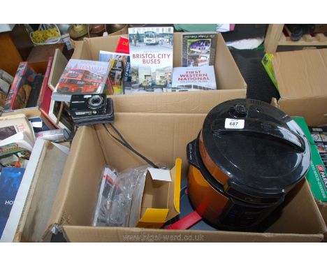 Box of DVD's of buses, trams etc books, Kodak camera, pressure cooker etc.