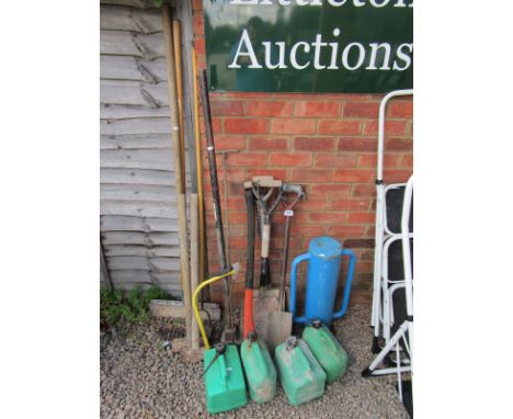 Various garden tools to include post driver