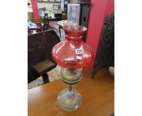 Oil lamp with cranberry glass shade