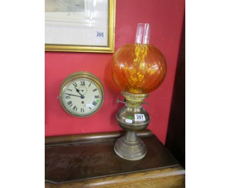 Ship's wall clock and oil lamp