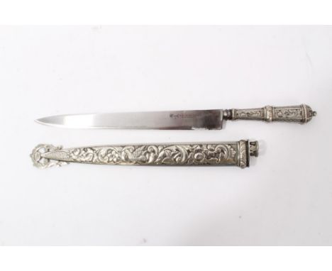 South American Gaucho hunting knife with ornate white metal grip with foliate decoration and steel blade by Scholberg &amp; J
