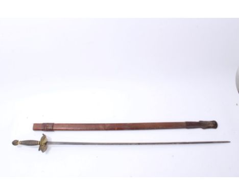 Late 18 th century French officers’ sword with gilt brass shell guard and engraved double-edged straight blade, the guard eng