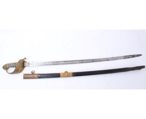 Victorian Royal Navy Officers Sword, with gilt brass hilt with lions head pommel, folding langet and wire bound fish skin gri