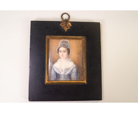 English School, early 19th century, Portrait miniature of a lady, watercolour on ivory, in ebonised frame, overall, 14cm x 12