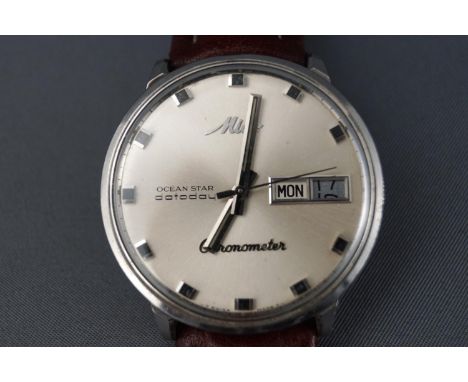A Mido chronometer stainless steel wrist watch with leather strap. Reference 5049 / 5300173 46.3 grams