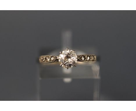 A white metal single stone old cut diamond ring approx 0.50ct with old rose cut shoulders. Colour J/K Clarity SI1/SI2 Stamped