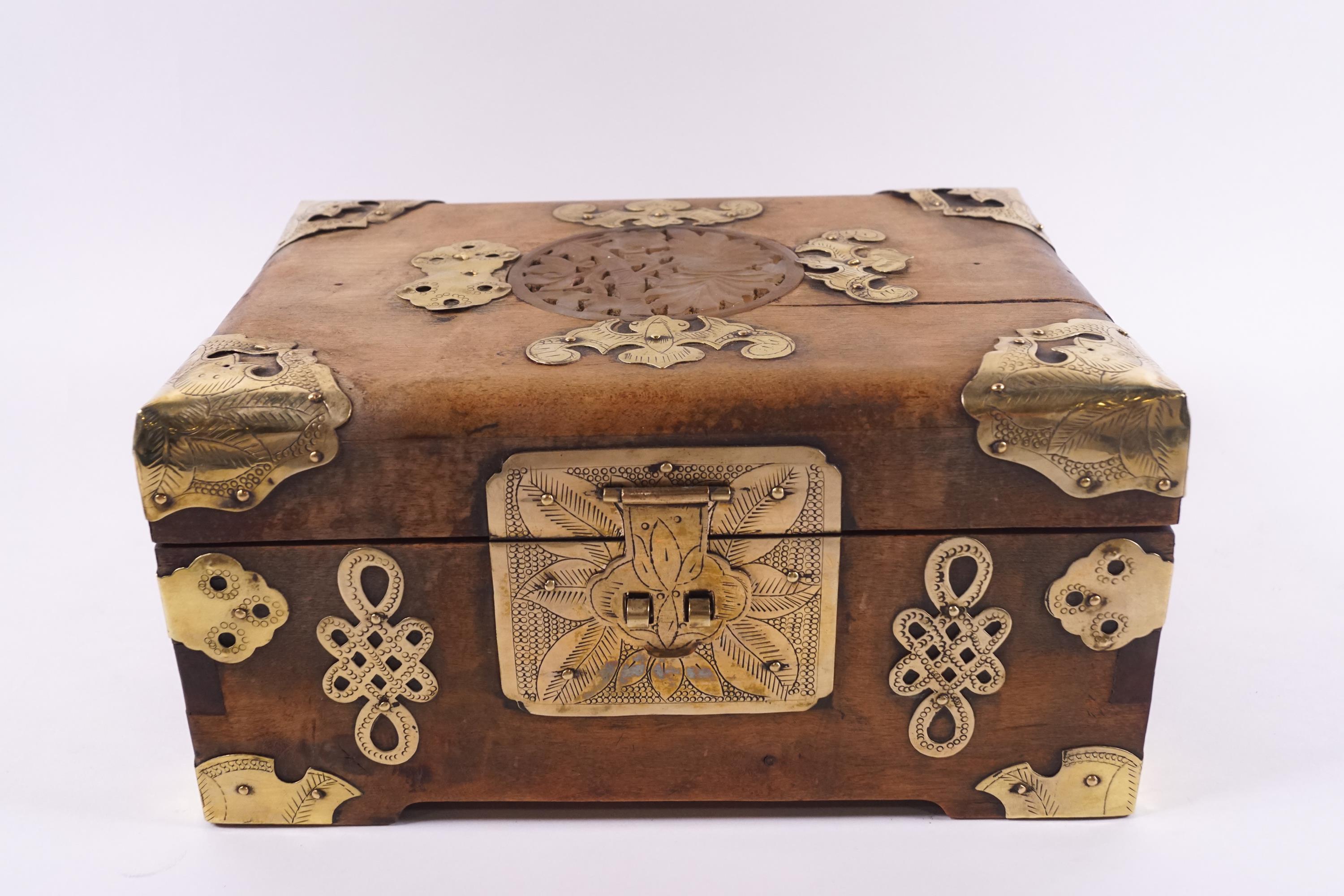 A Chinese Jewellery Box With Decorative Brass Mounts And Side Handles 