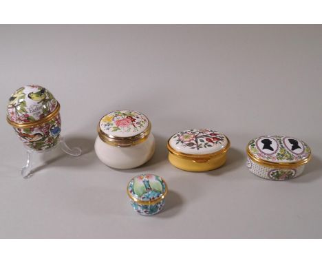 Five enamel trinket boxes, one modelled as an egg, by Birmingham Mint, Halcyon Days, Staffordshire Enamels, the largest 5cm d