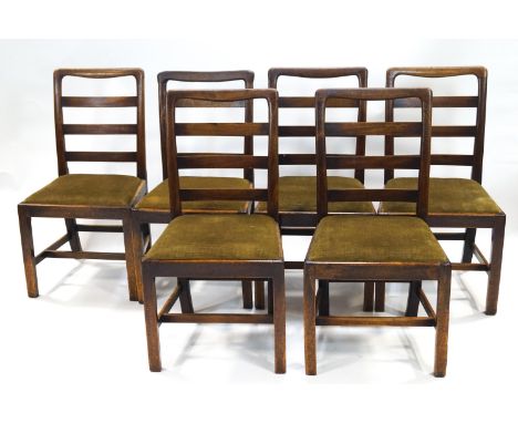 A set of six 19th century mahogany ladder back dining chairs with green upholstered drop -in seats