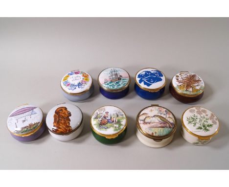 Nine enamel trinket boxes, mostly by Crummles, varous subjects to the lids, 6.5cm diameter