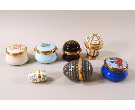 Seven enamel trinket boxes, three modelled as eggs, including Danbury Mint and Staffordshire Enamels, the largest circular bo
