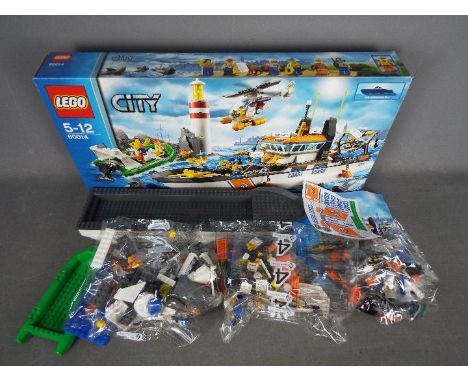 LEGO - # 60014 City Coast Guard Patrol set, the box has been opened but the parts are still in their factory sealed bags. The