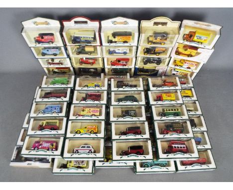 Lledo - A boxed collection of 70 diecast model vehicles by Lledo. Lot includes DG021060 10 CWT Light Van 'The Wizard'; DG1730