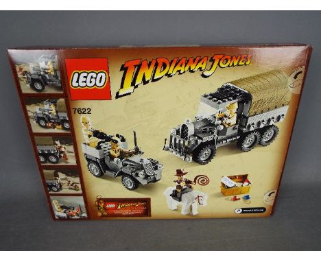 LEGO - # 7622 Indiana Jones Race For The Lost Treasure set. The box has been opened and the parts are in zip lock bags so it 