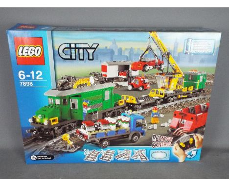 LEGO - A boxed Lego City Cargo Train Deluxe set # 7898 still factory sealed, the box appears Near Mint with only light storag