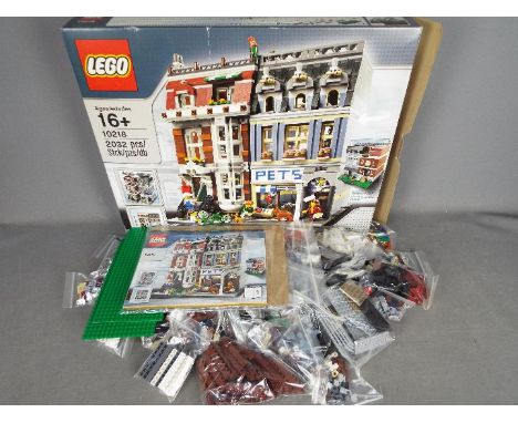 LEGO - #10218 Pet Shop set in an open box with parts in zip lock bags so it is unchecked for completeness. The box is Good wi