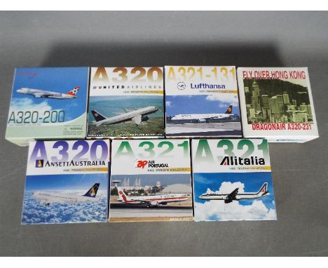 Dragon Wings - A collection of seven diecast model aircraft in 1:400 scale by Dragon Wings. Lot includes #55020 A321 'Alitali