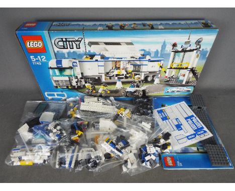 LEGO - # 7743 City Police Command Centre set in an open box with the parts in zip lock bags so it is unchecked for completene