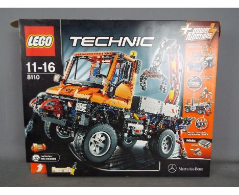 LEGO - A boxed Lego Technic motorized Mercedes Benz Unimog # 8110. The box has been opened and all the parts are in zip lock 