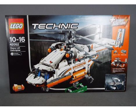 LEGO - A boxed Lego Technic powered Heavy Lift Helicopter # 42052 still factory sealed in its box which has only light storag