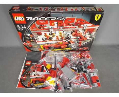 LEGO - # 8144 Racers Ferrari F1 Team set Kimi Raikkonen edition. The box has been opened and the parts are in zip lock bags s