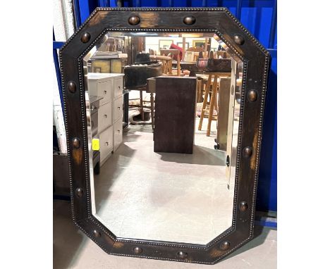 An oak framed 1930's wall mirror with beaded border with canted edges 