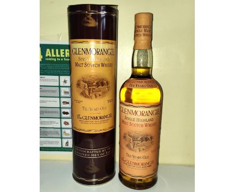 A vintage bottle of 10 year old Glenmorangie single malt whisky in tin 