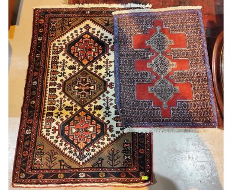 A modern Serab rug with red and blue ground, 98 x 75cm; a John Lewis handmade item, 146 x 103cm 