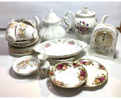 A selection of Royal Albert Old Country Roses teaware; similar teaware; an Aynsley clock and trinketware; 2 teapots 