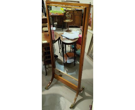 A mahogany framed cheval mirror with four splay feet 