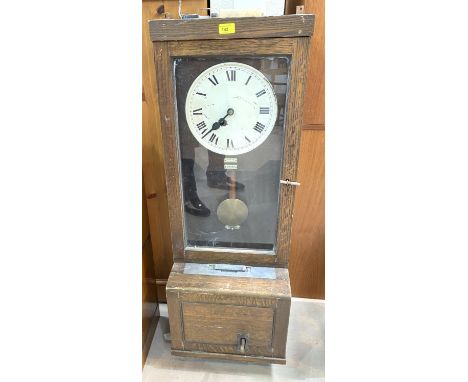 A clocking-in clock in oak case with pendulum and painted dial, No 59562 
