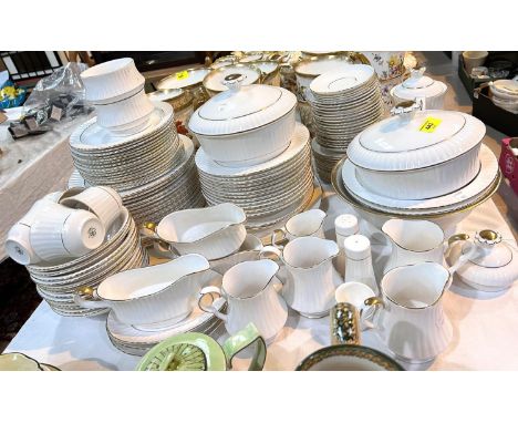 A large part dinner/tea service with gilt rims and fluted borders by Royal Worcester/Hammersley/Spode, 115 pieces approx 