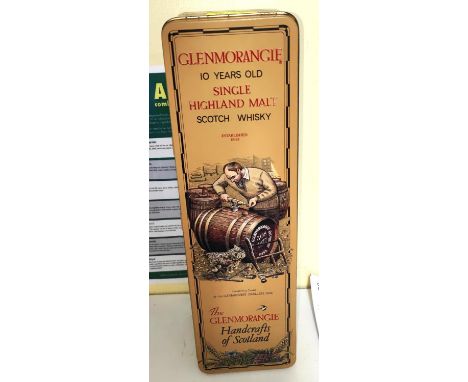 A 1980's bottle of 10 year old Glenmorangie single malt Scotch whisky in original tin 