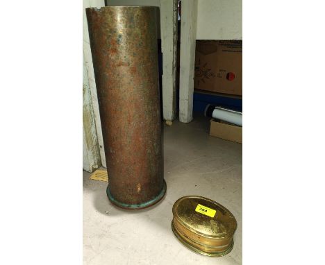 A large brass, possibly naval snuff box 'A spoon is all we can boast' and a large brass shell casing 