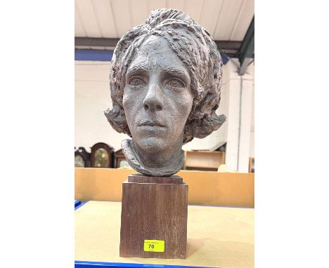 A bust portrait of a woman in bronze finish plasterwork, hardwood plinth, 47cm 