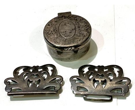 A hallmarked silver circular snuff box with floral decoration, gilt interior, Birmingham 0.87oz and a white metal belt buckle