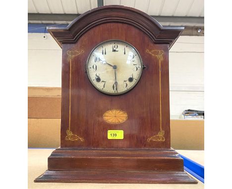 A mantel clock in inlaid mahogany Art Nouveau case with dome top, American movement by Wm L Gilbert 