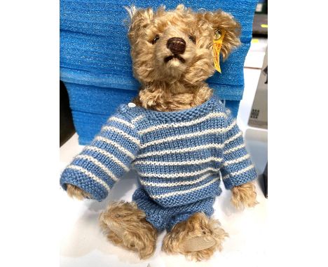 A modern Steiff Teddy Bear with blue striped jumper, button to ear 