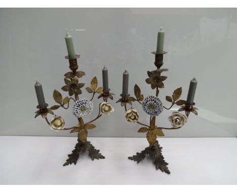 A pair of 19th Century brass and ceramic candle stands, 43.5cm tall