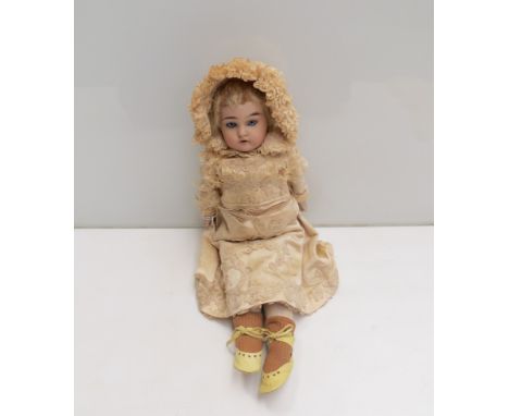 A 13" bisque head girl doll in cream silk outfit, head stamped 1896