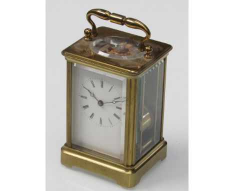 A 19th Century French brass carriage clock with Roman enamelled dial (hairlined), platform escapement and striking train with