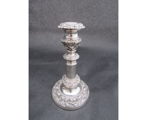 A Thomas Blagdon and Co, silver telescopic candlestick with embossed decoration, Sheffield 1823, 21cm tall