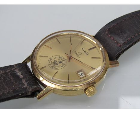 OMEGA: An 18ct gold manual wind gent's wristwatch with gilded dial, centre seconds and date aperture, the dial with Sate of Q